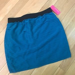 Blue ruffled body con skirt